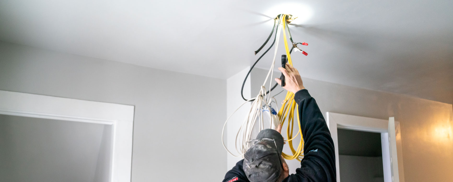 electrician rewiring a house
